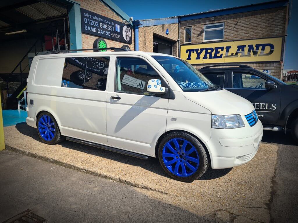 white van blue alloys